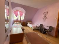 Posteľ alebo postele v izbe v ubytovaní Hermina apartmanház