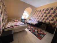 Posteľ alebo postele v izbe v ubytovaní Hermina apartmanház