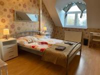 Posteľ alebo postele v izbe v ubytovaní Hermina apartmanház