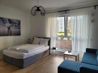 Posteľ alebo postele v izbe v ubytovaní 16 Apartamenty Ptak Szpital Matki Polki Szpital Kopernika Mandoria Orientarium Atlas Arena Plac Zabaw - Zamojska 20a m16 Parking