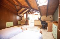 Posteľ alebo postele v izbe v ubytovaní Soffitta House Sofi!