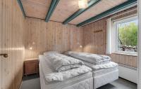 Postel nebo postele na pokoji v ubytování Holiday Home Klyden Rømø Iv