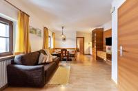 A television and/or entertainment centre at Florerhof Ferienwohnung Lavendel
