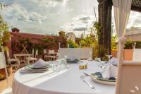 a table with a white table cloth on a patio at Riad Dar Saad - Hammam & Spa in Marrakech
