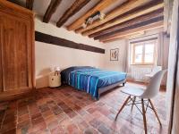 Posteľ alebo postele v izbe v ubytovaní Les gîtes de la Ferme de Pan - Pruniers-en-Sologne
