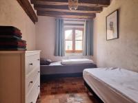 Posteľ alebo postele v izbe v ubytovaní Les gîtes de la Ferme de Pan - Pruniers-en-Sologne