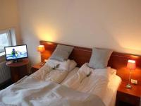 Postel nebo postele na pokoji v ubytování Hotel Hirtshals