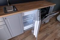 Kuchyňa alebo kuchynka v ubytovaní Griff 1. apartman Pécs