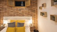 Postel nebo postele na pokoji v ubytování La Quinta Calle - Apartamentos Aloha Toledo