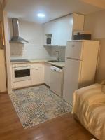 Kuchyň nebo kuchyňský kout v ubytování Urbanización La Isla, apartamento