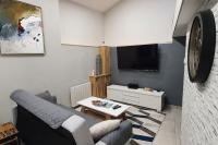Televízia a/alebo spoločenská miestnosť v ubytovaní Sweet LOFT A PERIGNAT !!!