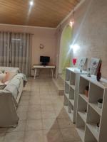 Televízia a/alebo spoločenská miestnosť v ubytovaní Casa Dei Fiori