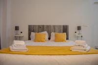 Posteľ alebo postele v izbe v ubytovaní Novam Loft Terrace Centro Málaga