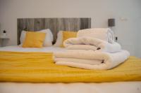 Posteľ alebo postele v izbe v ubytovaní Novam Loft Terrace Centro Málaga