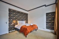 Łóżko lub łóżka w pokoju w obiekcie 2.Luxueux Duplex 6/8pers/Full Equipped/République