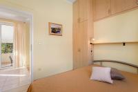 Postel nebo postele na pokoji v ubytování Apartments Ljubica Pulj