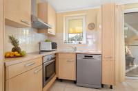 Kuchyň nebo kuchyňský kout v ubytování Apartments Ljubica Pulj