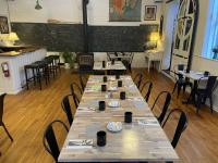 a row of tables and chairs in a restaurant at Jackson's Falls Country Inn in Milford
