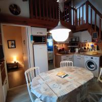 Kuchyňa alebo kuchynka v ubytovaní Appartement cosy à quelques pas de la plage de la Rémigeasse