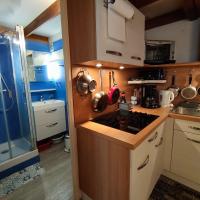 Kuchyňa alebo kuchynka v ubytovaní Appartement cosy à quelques pas de la plage de la Rémigeasse