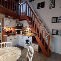 Kuchyňa alebo kuchynka v ubytovaní Appartement cosy à quelques pas de la plage de la Rémigeasse
