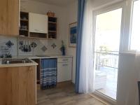 Kuchyň nebo kuchyňský kout v ubytování Hamo Apartments & Soba