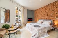Posteľ alebo postele v izbe v ubytovaní GRAND STUDIO CLIMATISE TRES PROCHE MONACO