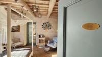 A bed or beds in a room at Podere Le Vedute