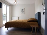 Posteľ alebo postele v izbe v ubytovaní Maison 15 personnes périphérie de Clermont-Ferrand