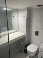 Kúpeľňa v ubytovaní Downtown City Apartment
