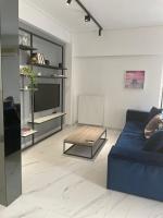 Posedenie v ubytovaní Downtown City Apartment