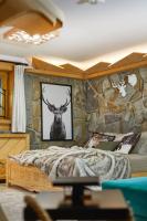 Posteľ alebo postele v izbe v ubytovaní Witkówka WILD Luxury Apartments - Sauna & SPA x Adults Only