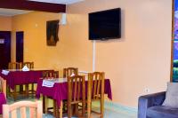 Μια τηλεόραση ή/και κέντρο ψυχαγωγίας στο Palmas Park Hotel y Restaurant