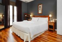 Postel nebo postele na pokoji v ubytování Fewdays Barcelona Apartments