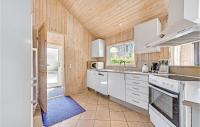 Kuchyň nebo kuchyňský kout v ubytování Holiday Home Udsigten Rudkøbing I