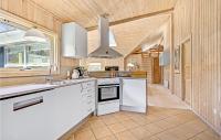 Kuchyň nebo kuchyňský kout v ubytování Holiday Home Udsigten Rudkøbing I