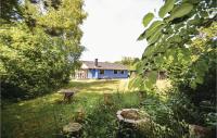Zahrada ubytování Three-Bedroom Holiday Home In Hjerm