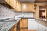 Kuchyňa alebo kuchynka v ubytovaní Riu Nere Mountain Apartments
