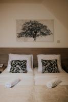 Posteľ alebo postele v izbe v ubytovaní Villa Garden