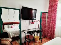 A bed or beds in a room at Acogedoras Habitaciónes en Madrid