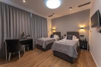 Posteľ alebo postele v izbe v ubytovaní Sky & Sun Luxury Rooms with private parking in the garage