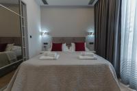 Posteľ alebo postele v izbe v ubytovaní Sky & Sun Luxury Rooms with private parking in the garage