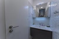 Kúpeľňa v ubytovaní Sky & Sun Luxury Rooms with private parking in the garage