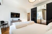Posteľ alebo postele v izbe v ubytovaní Majestic 4BR/4BATH apartment in Sagrada Familia area