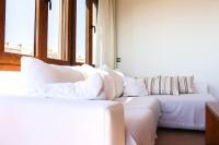 A bed or beds in a room at Apartamento Alcocebre Beach Resort