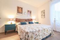 A bed or beds in a room at Casa Giovanetti