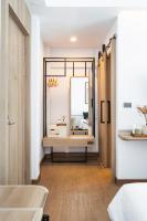 Postel nebo postele na pokoji v ubytování Darley Hotel Chiangmai