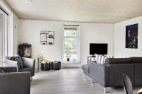 TV a/nebo společenská místnost v ubytování Sommerhus ved Vesterhavet