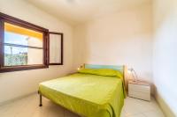 Posteľ alebo postele v izbe v ubytovaní ISS Travel, Ambra apartments - 800 m from La Cinta beach