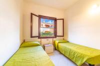 Posteľ alebo postele v izbe v ubytovaní ISS Travel, Ambra apartments - 800 m from La Cinta beach